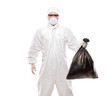 A man in uniform holding a black garbage bag isolated on white
