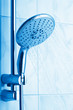 water flowing from metal shower