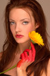 Woman with yellow flower. Woman with yellow flower.