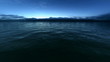 Looped flight over the sunset ocean