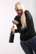 woman with a bottle wine and a bottle screw