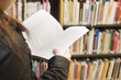 Young woman reading homeworks