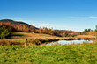 A pond in the country in Autumn in New England