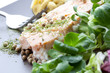 Salmon dish with salad