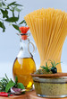 Authentic pesto sauce with its ingredients and Spaghetti.