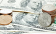 coins on dollars background