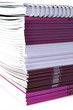 Pile of color magazines isolated on white background Pile of color magazines isolated on white background