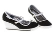 Girls' shoes on white.