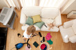 Blond woman vacuuming the living-room Blond woman vacuuming the living-room