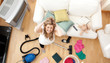 Frustrated blond woman vacuuming the living-room Frustrated blond woman vacuuming the living-room