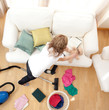 Blong young woman doing housework Blong young woman doing housework