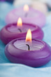 purple toned candles on baby blue silk (1)