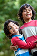 Brothers playing outdoors