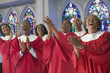 African men and women singing in church choir