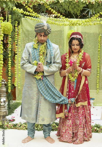 Photo: Indian bride and groom in traditional dress Indian bride and groom in traditional dress