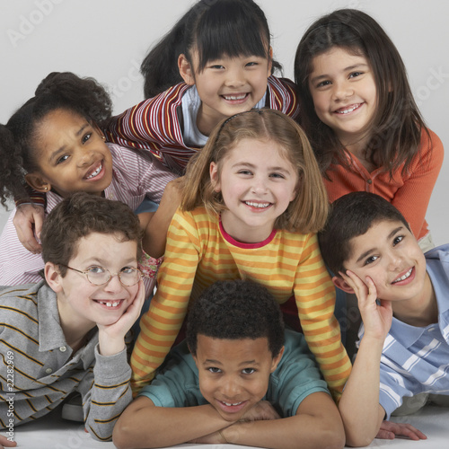 Photo: Multi-ethnic children in a pile Multi-ethnic children in a pile