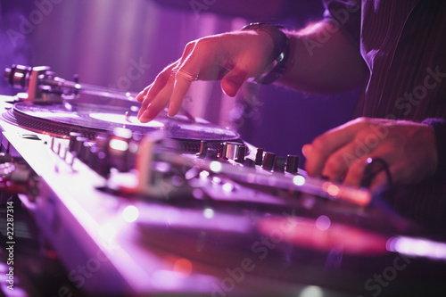 Photo: Close up of Hispanic nightclub dj Close up of Hispanic nightclub dj