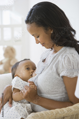 Photo: African American mother breastfeeding baby African American mother breastfeeding baby