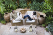 Multi-ethnic couple relaxing outdoors