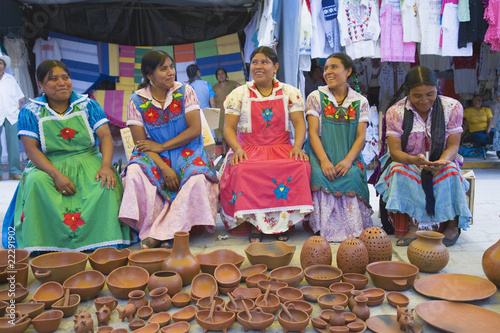 Photo: Group of indigenous Mexican women selling pottery Group of indigenous Mexican women selling pottery