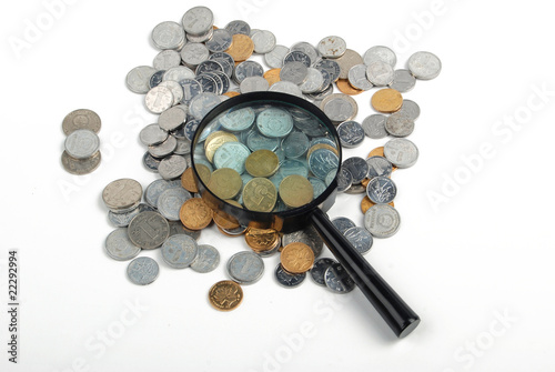 Photo: magnifier and coins magnifier and coins