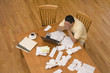 Hispanic man paying bills