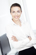 Beautiful young businesswoman at office