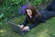 Lying in grass with laptop Lying in grass with laptop