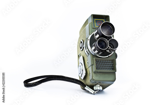 Photo: old cine camera on white isolated old cine camera on white isolated