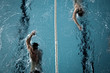 Schwimmtraining der Sportler im Hallenbad Schwimmtraining der Sportler im Hallenbad