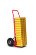 Hand truck with gold bars over white background Hand truck with gold bars over white background