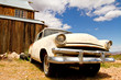 Photo: Old classic car in desert Old classic car in desert