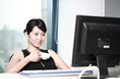 young asian businesswoman working with computer in office