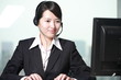Photo: young asian woman with computer young asian woman with computer
