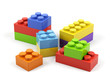 Plastic toy blocks on white background.