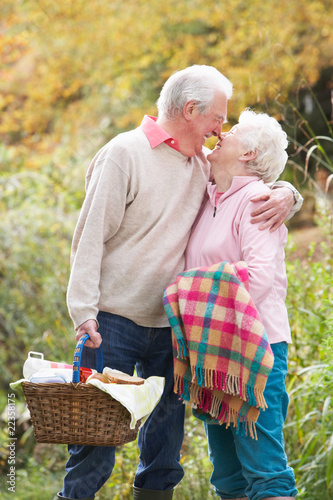 Photo: Romantic Senior Couple Outdoors With Picnic Basket By Autumn Woo Romantic Senior Couple Outdoors With Picnic Basket By Autumn Woo