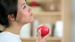 Video: Woman eating an apple Woman eating an apple
