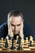 Man at chess board