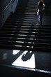 Photo: Girl going upstairs in subway Girl going upstairs in subway