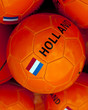 a orange soccerball with dutch flag