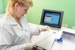 woman Scientist using mwdical equipment