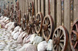 Photo: Wheels Are Hanging On A Fence Wheels Are Hanging On A Fence
