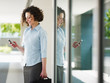 Photo: woman reading emails outdoor woman reading emails outdoor