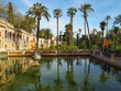 Summer garden view of Alcazar of Seville Spain