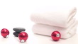 Spa massage stones towels and holiday baubles - HD