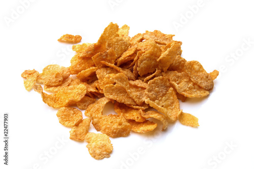 Photo: corn flakes su fondo bianco corn flakes su fondo bianco