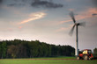 Foto: Wind turbine and tractor Wind turbine and tractor