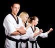 Foto: People in kimono make martial arts exercise People in kimono make martial arts exercise