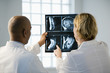Photo: Doctors looking at xray. Doctors looking at xray.