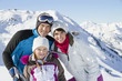 Happy family in snow